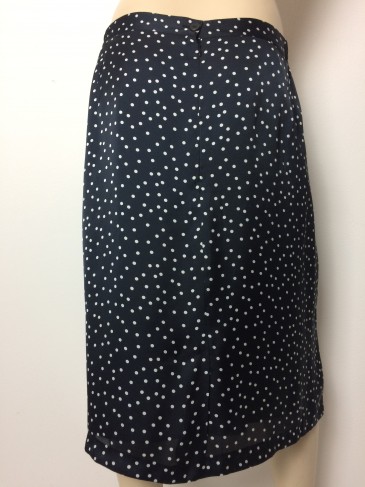 Jupe à pois blanc fond noir